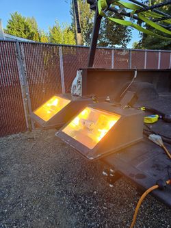 2 Outdoor lights w/pole mount bracket
250 watts, multi tap