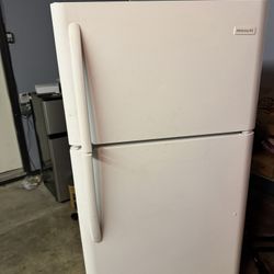 Refrigerator plugged in and Working