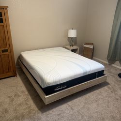 Queen size tempurpedic mattress and frame, upright samick piano, pottery barn couch