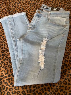 Fashion Nova Light Blue Skinny Jeans with Frayed Knee Detail