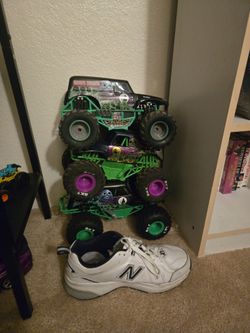 Three large Grave Digger monster trucks