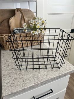 Black metal storage basket $10