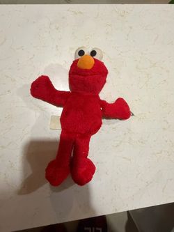 Sesame Street Elmo red plush toy