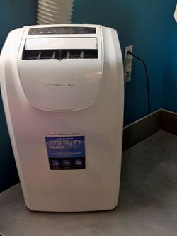 Just in time for summer gently Used/ works like new  12,000 BTU Oslo portable AC unit  with vent hose and window adapter works great cools fast was ow