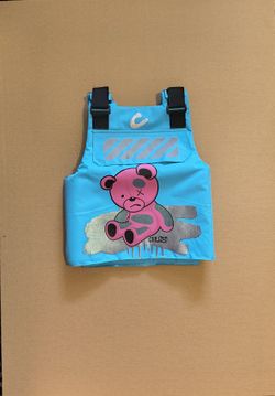 Civilized bear graphic costume or paintball vest in a bright blue color. 