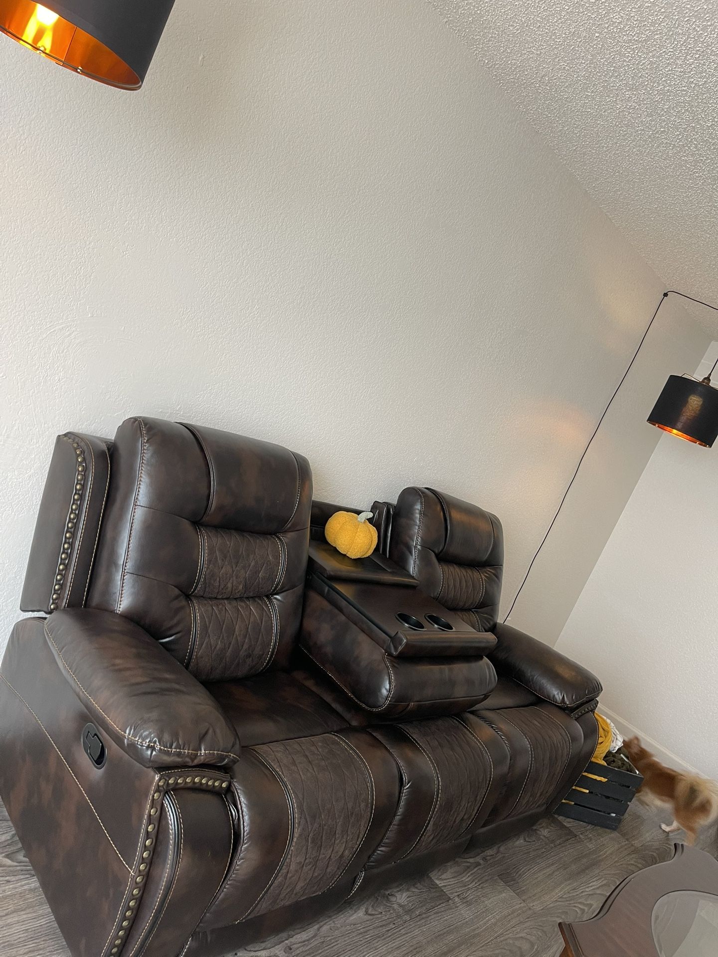 Brown Leather Couch With Two End Recliners, Middle Charging Deck With Two Cupholders Wooden Coffee Table