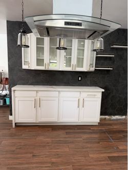 White pantry for kitchen with cabinets and cascading stone