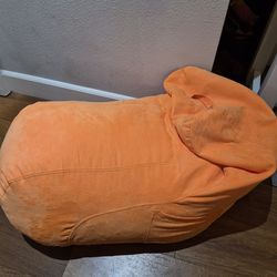 Bean bag with handle and pocket