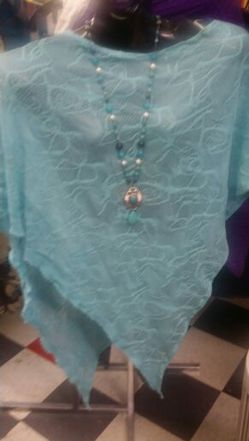 Turquoise poncho and necklace