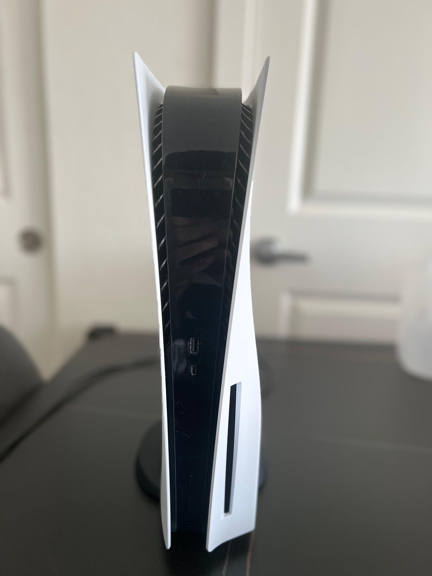 PS5 With A Controller With The Game Built In God Of War