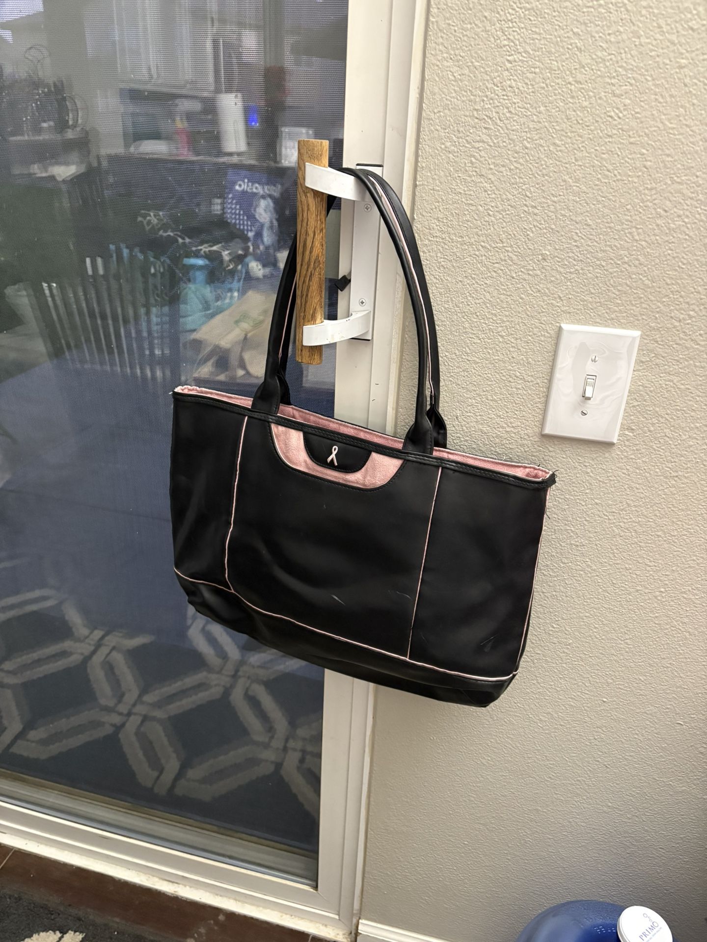 Extra large shoulder black leather women’s bag good for weekend or overnight traveling