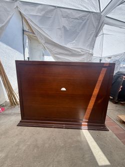 Dark mahogany TV mount