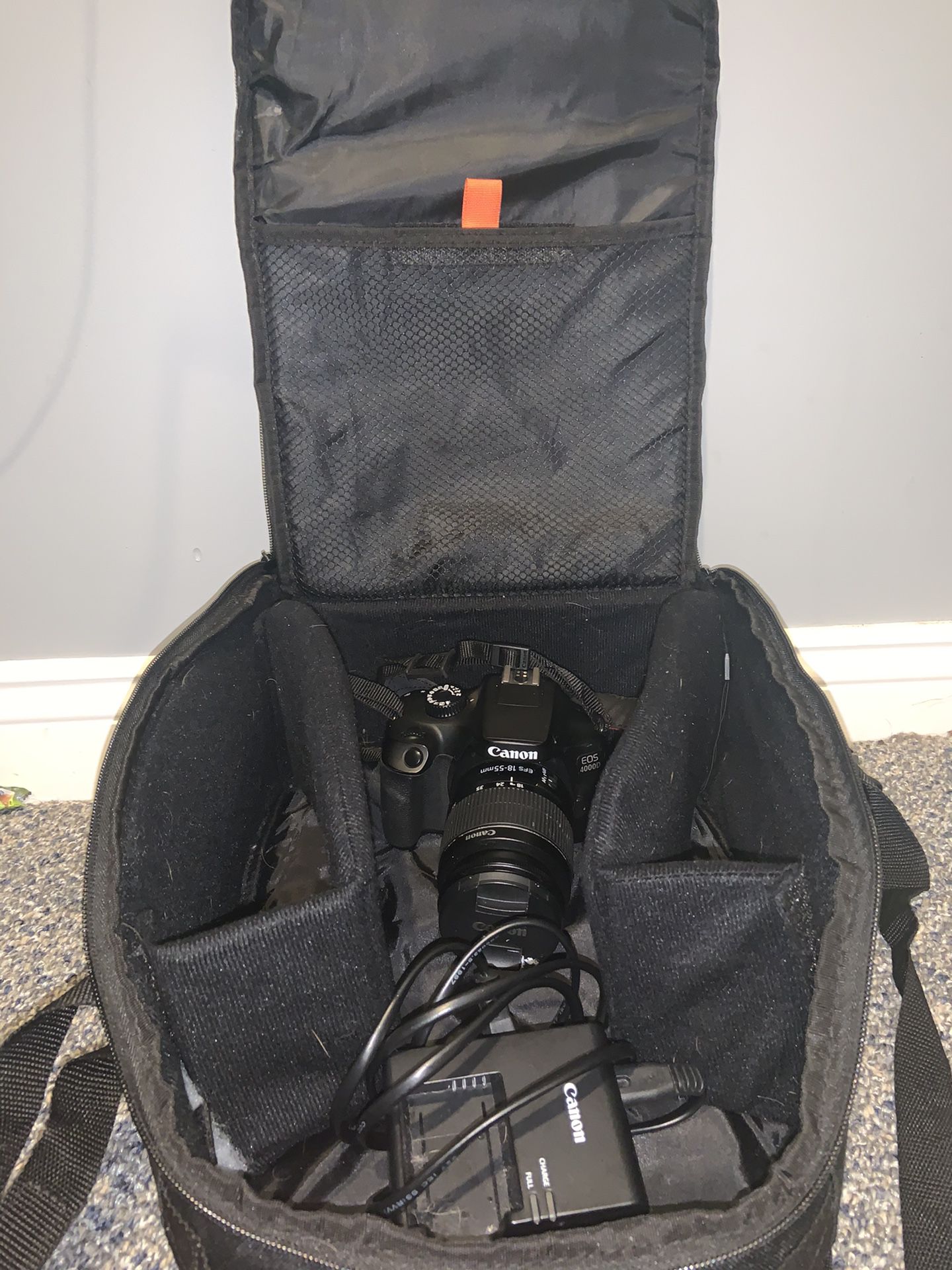 Eos 4000d with charger, battery, kit lens 18-55 and ultimax camera bag