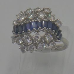 18kt white gold ring 5.9 grams 17 diamonds 1 carat size 6.5 very good condition. 864287-1.