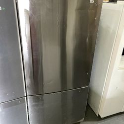 LG 33” Bottom freezer refrigerator NO HANDLES and DENTED $400