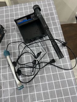 Water filter pump with heater