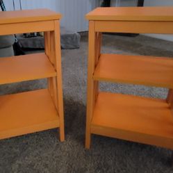 A Pair Of Orange Multi Purpose Tables