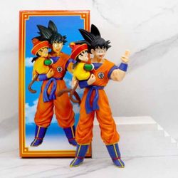 Dragon Ball Z collectible statue featuring Son Goku holding  son, Gohan.