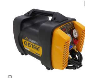 The refrigerant recovery machine is new.