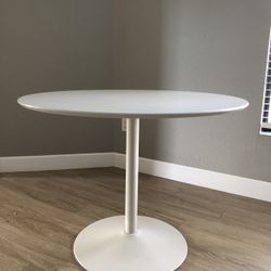 CB2 Dining table, White, 39”W x 30.25”H