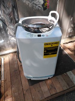 Portable compact washer