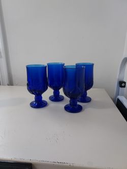 4 Piece  Beautiful Blue Glassware. 