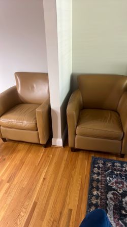 Two Leather Chairs