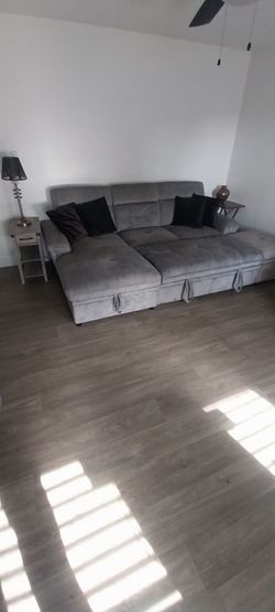 Large Gray Sectional Sofa with Storage Ben's, plus multi-purpose end table with charging station