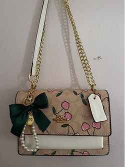 Cherry coach bag