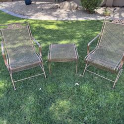 Wrought Iron Rocking Chairs And Side Table