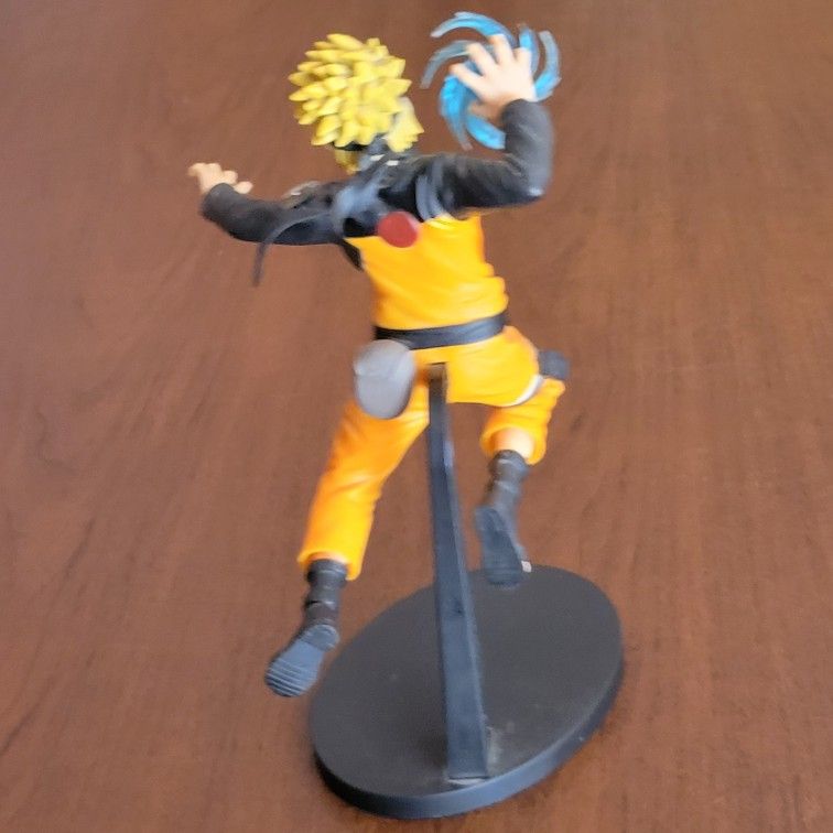 Naruto Shippuden Uzumaki figure Bandai Spirits with stand. Pre-owned, 
good shape, please see photos for details. It is 8.5" tall, weight 7z 
plus shi