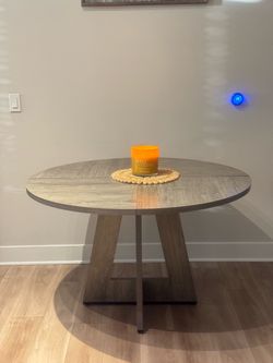 NEED GONE Round Wood-Tone Dining Table