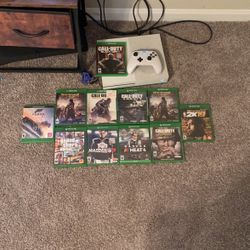 Xbox One Console with 11 games and a controller