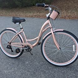 Beautiful Rose Gold Cruiser Bike With Cup And Cell Phone Holder