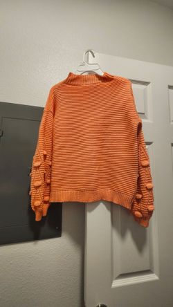 Orange Knit Sweater with Pom-Pom Sleeves