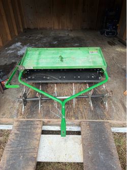 John Deere thatcher aerator