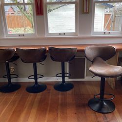 4 Faux Suede Swivel Bar Stools