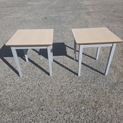 2 NEW END TABLES. WOOD TOP METAL LEGS. 