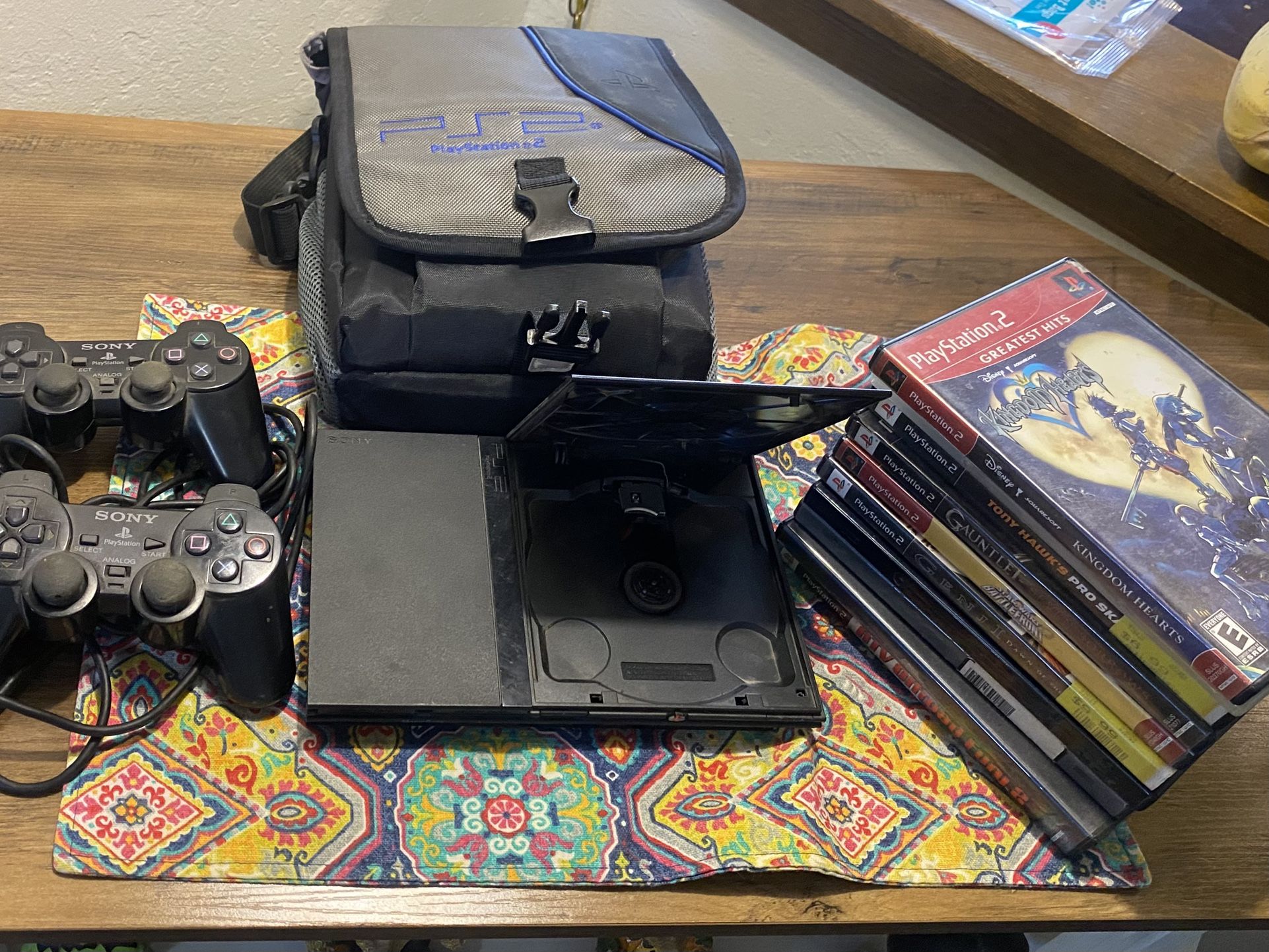 PS2 Bundle With 2 Controllers And 9 Games