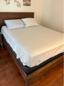 Solid Queen bed frame and box spring