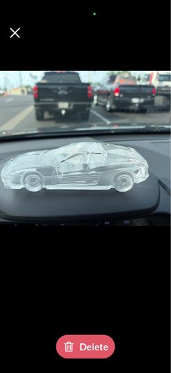 clear glass Ferrari Testarossa model paperweight, likely a vintage piece produced by Hofbauer in West Germany during the 1980s.Material: It is crafted