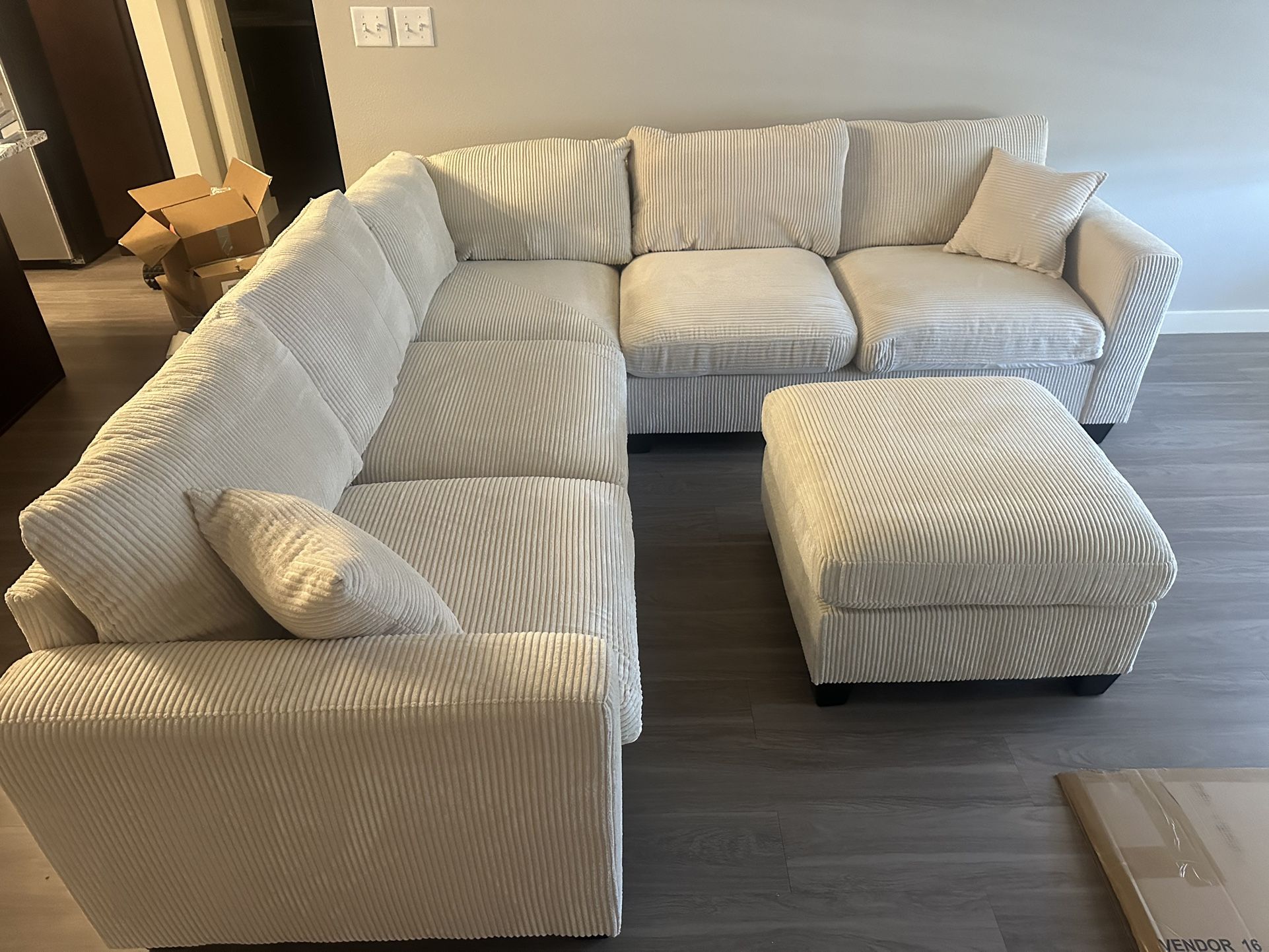 Beige Colored Corduroy Couch With Ottoman