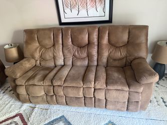 Like new Ashley furniture reclining sofa and love seat (love seat reclines and rocks)