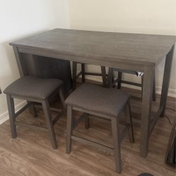 Caitbrook Counter Height Dining Table With Shelves+Stools