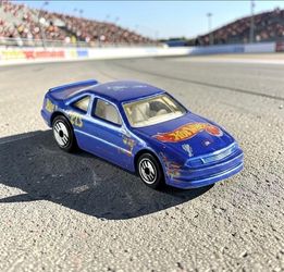 1996 Hot Wheels #1 Lumina Stocker HW Race Team Edition Die-Cast1:64 Race Car Toy. This is a 1996 Hot Wheels Lumina Stocker in metalflake blue from the