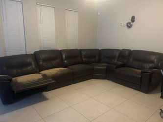Sectional couch with a recliner