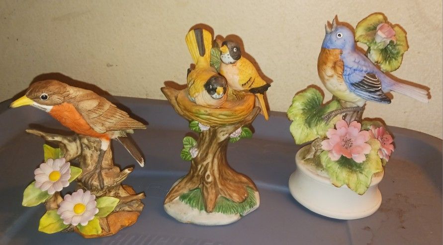 vintage Of Three porcelain bird figurines on floral branches