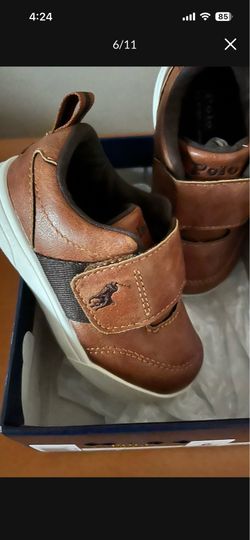 There very cute shoes for Boys the size is 6 The color is Tan Brown it’s made by RALPH LAUREN