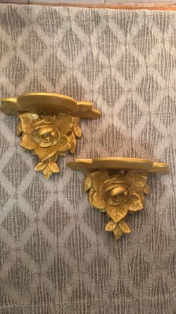 Two vintage gold colored wall sconce the Import Collection