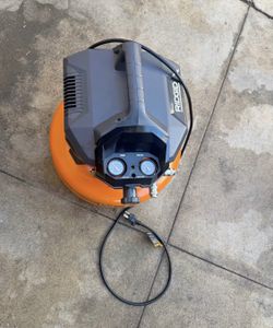 RIDGID 6 Gal. 150 PSI Portable Electric Oil-Free Jobsite Pancake Air Compressor with Dual Pressure G